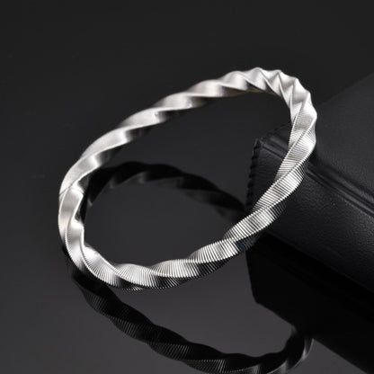 Luxury Twisted Ribbed Bangle – Gold & Silver Finish