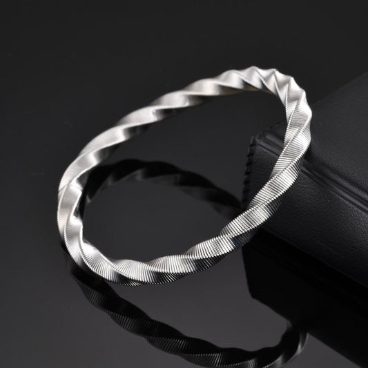Luxury Twisted Ribbed Bangle – Gold & Silver Finish