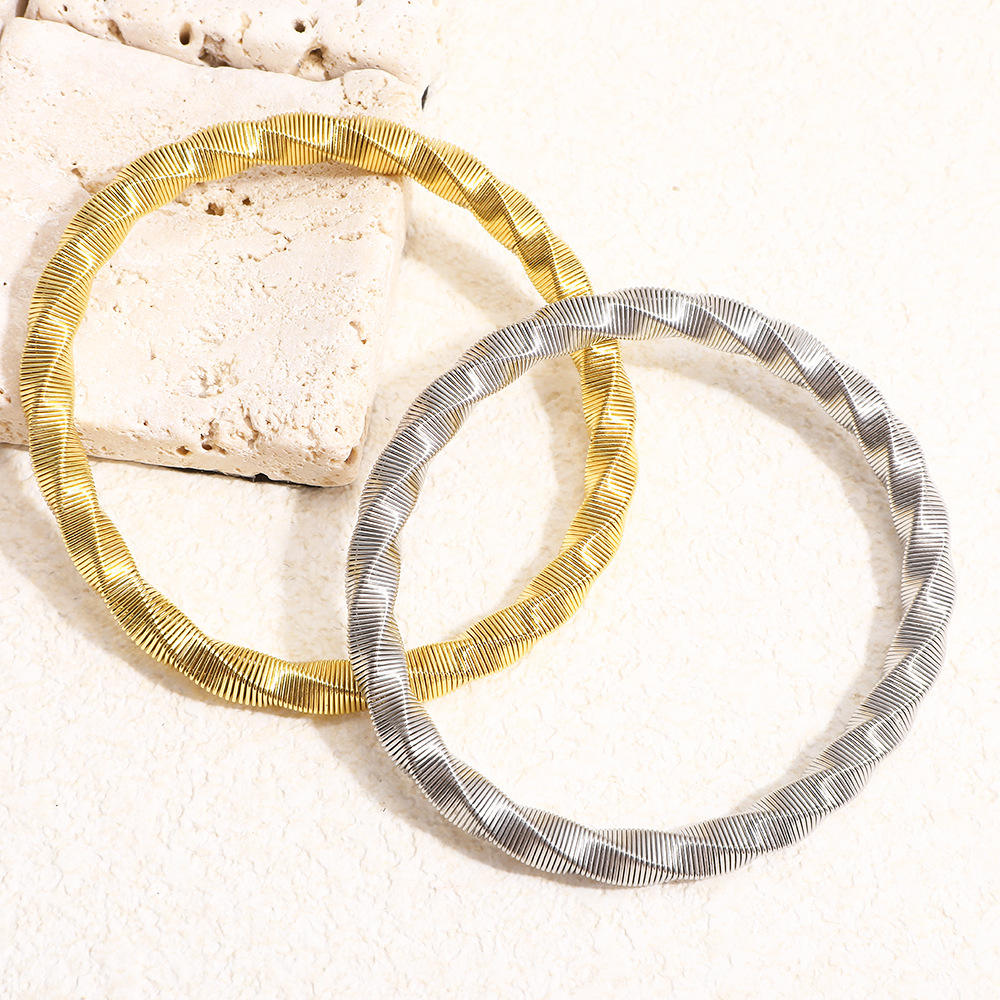 Luxury Twisted Ribbed Bangle – Gold & Silver Finish