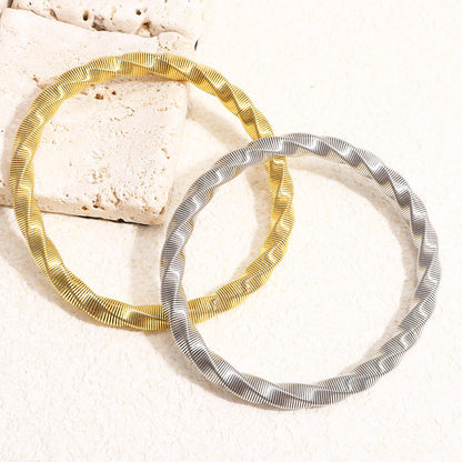 Luxury Twisted Ribbed Bangle – Gold & Silver Finish