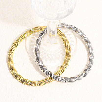 Luxury Twisted Ribbed Bangle – Gold & Silver Finish