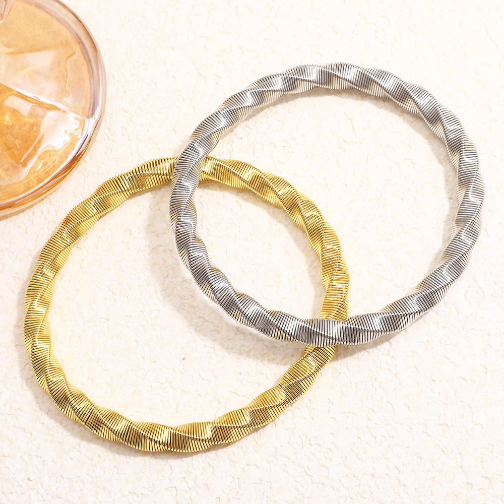 Luxury Twisted Ribbed Bangle – Gold & Silver Finish