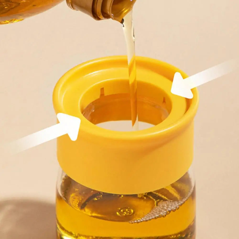 Olive oil dispenser with brushes